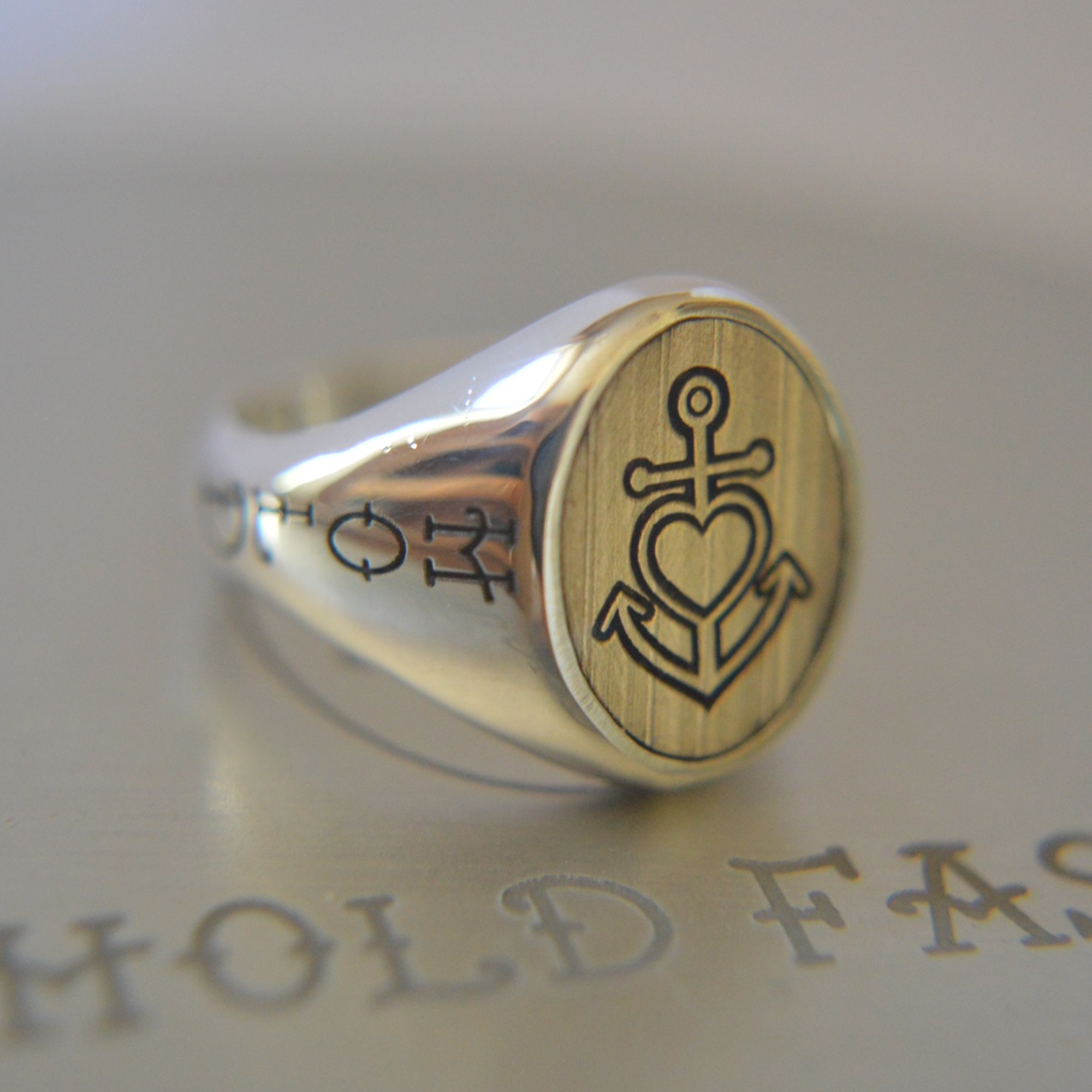 Silver Ring With Heart and Anchor Design 